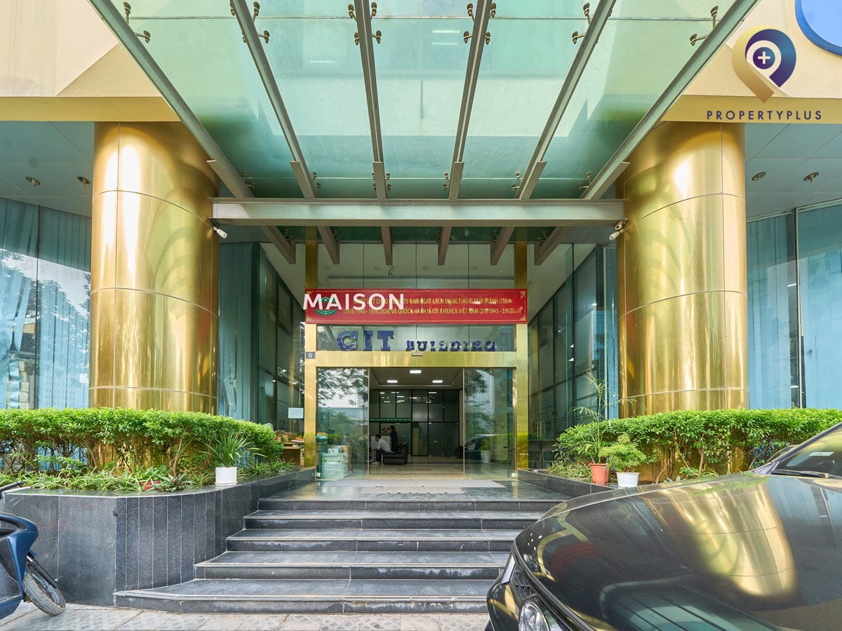 Entrance lobby of CIT Building with glass doors and golden pillars - hình ảnh từ Property Plus